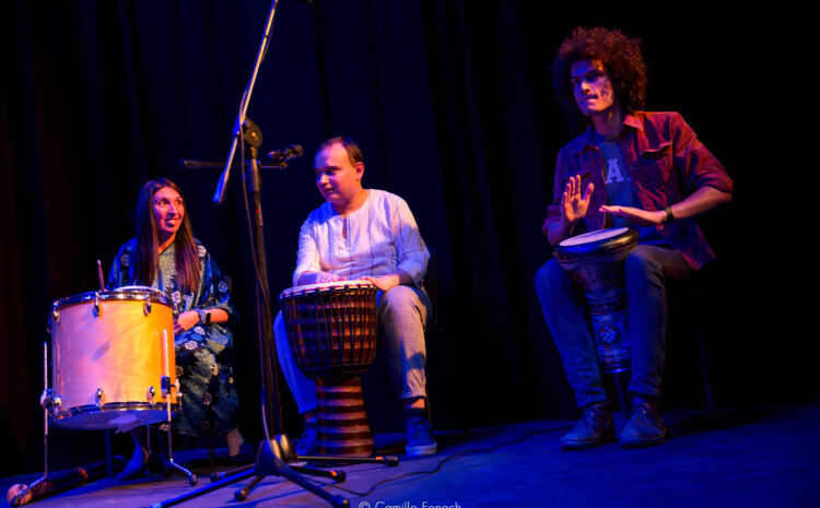 A photo showing members of the group Opening Doors performing on drums