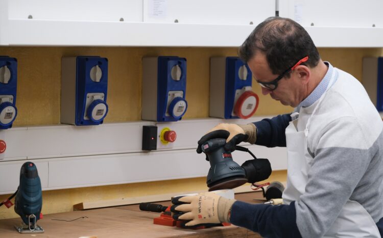 An image showing a man using woodwork power tools at the Valletta Design Cluster