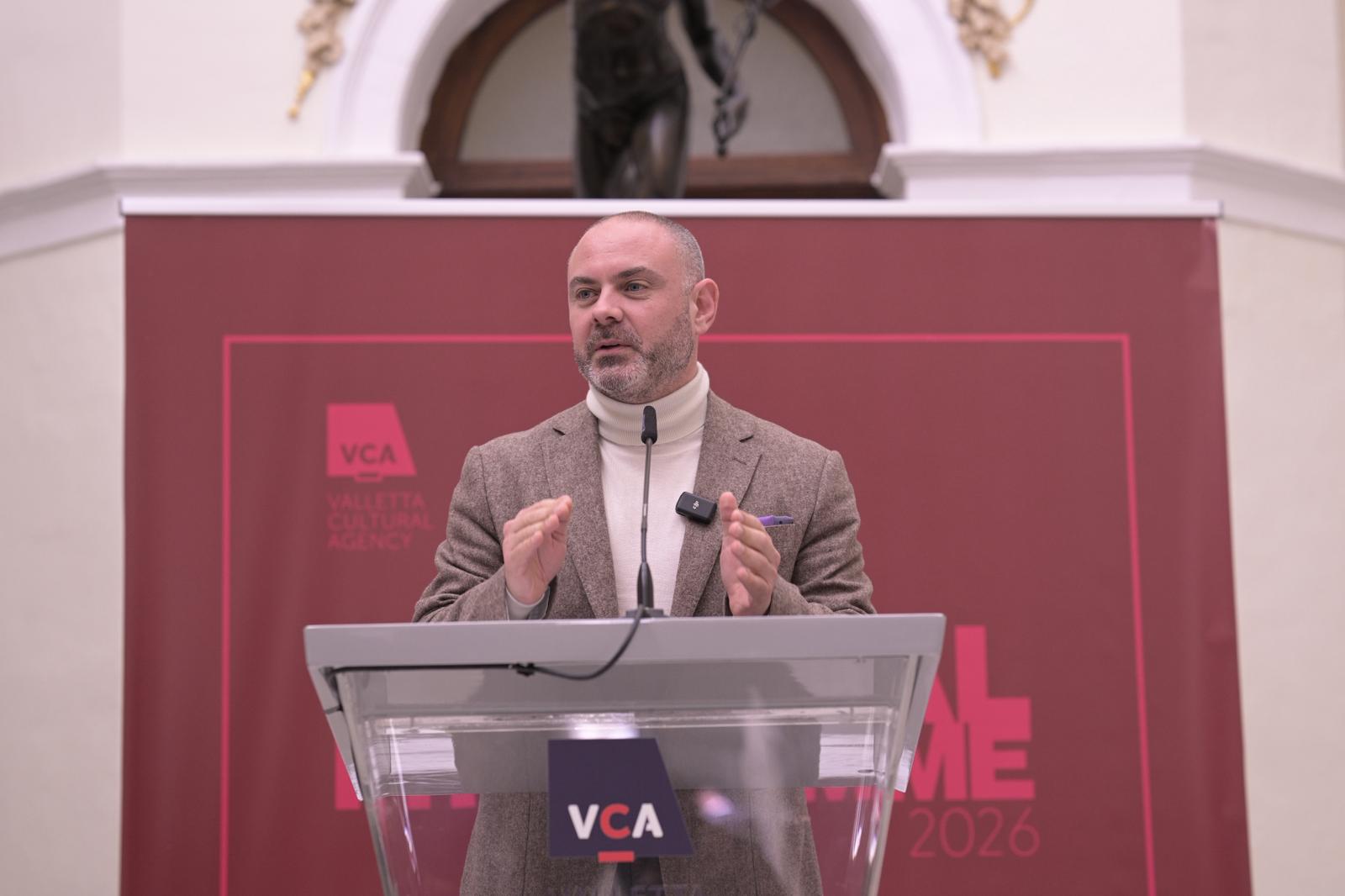 A photo showing Minister Owen Bonnici delivering his address