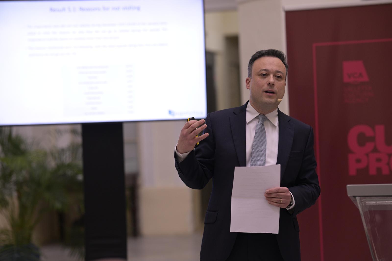 A photo showing Prof. Vince Marmara delivering his presentation at the Chamber of Commerce