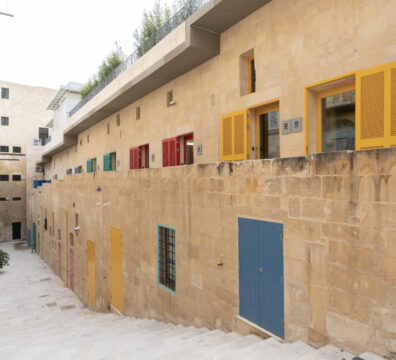 A photo showing the studios with colourful doors at the Valletta Design Cluster